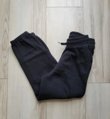 Pantalones deportivos Old Navy negros talla M niños. Unisex. Foto 1 de 3