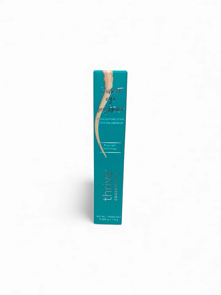 Aclarador de ojos brillante Thrive Causmetics Stella Champagne Shimmer Stick Foto 1 de 1