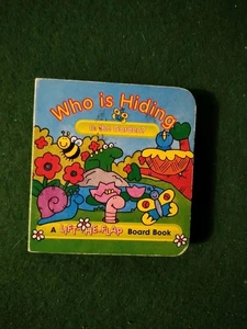 Who is Hiding in the Garden A LIFT THE FLAP BOARD BOOK - Picture 1 of 2