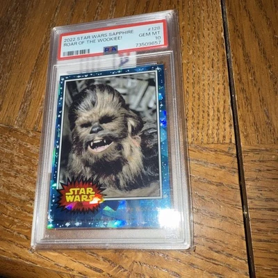 2022 TOPPS STAR WARS: BLUE SAPPHIRE, ROAR OF THE WOOKIEE! #128 PSA 10 - Image 1 of 2