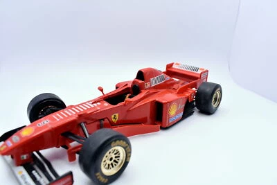 Modellini auto FORMULA 1 scala 1:24 Ferrari F310B Burago Schumacher modellismo - Immagine 1 di 3