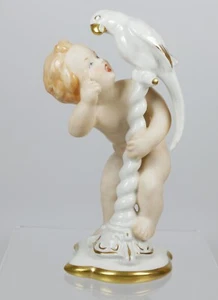 Schöne Art Deco Alka Kunst Porzellan Cherub mit Papagei gold & weiß Farbe - Bild 1 von 4