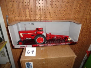 1/16   farmall 706 with 4 bottom plow - Picture 1 of 4