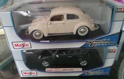 LOTE de dos Mini Cooper Green & Beetle (1955) Die Cast MAISTO Modelo Escala 1:18 Foto 1 de 4