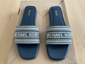 Michael Kors, Pantoletten Sadler Slide, Dunkelblau, US 8,5 = EU 39, Neuw - Bild 1 von 7