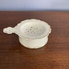 vintage porcelain tea strainer 