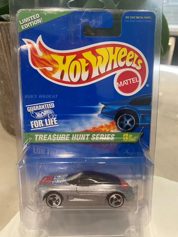 1997 Hot Wheels #586 Tesoro Caccia Serie 9/12 Buick Wildcat Argento W/Proteggi - Immagine 1 di 1