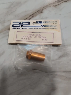 NOS Vintage Team Associated RC10 6455 .56 Shock Body  Light Gold - Image 1 of 2