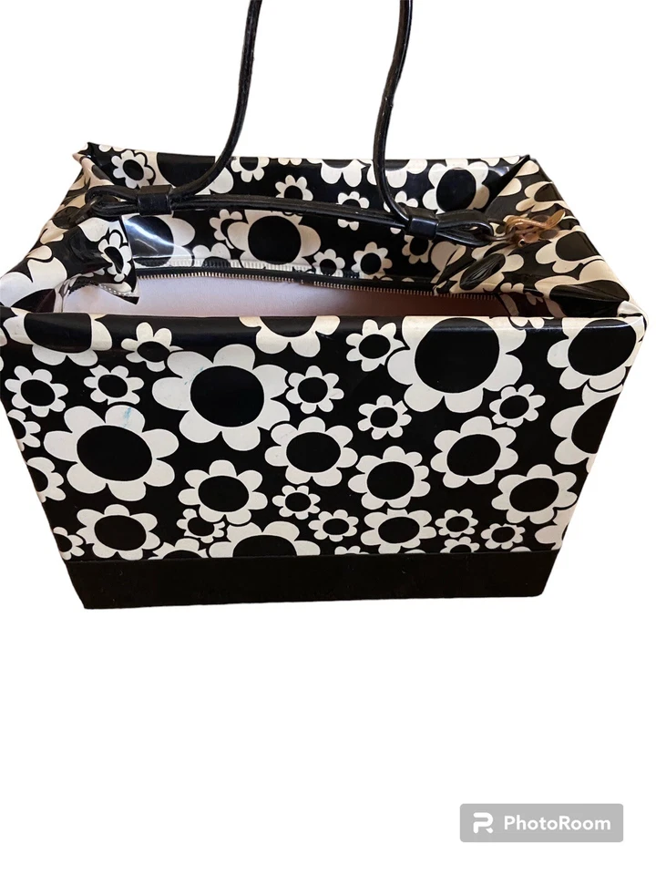 Rodillos rizadores de vinilo vintage años 60 1968 estuche margaritas blanco y negro como está Foto 1 de 4