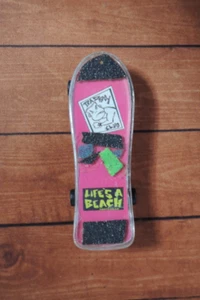 Authentic Vintage Life's A Beach Bad Boy Club Finger Skateboard Key-chain 80's - Picture 1 of 4