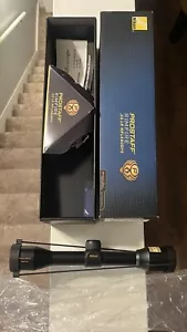 Nikon Prostaff 4X32 Rifle Scope Rimfire Matted Black W/ Box + Manuals + Cover - Picture 1 of 22