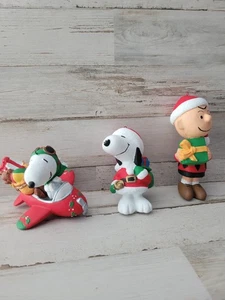 Peanuts Santa Snoopy, Charlie Brown Weihnachtsschmuck Flugzeug Snoopy Set/3 - Bild 1 von 6
