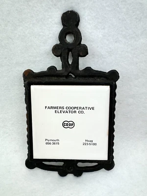 Remache de cocina elevador COOP publicidad vintage de hierro fundido y cerámica Foto 1 de 4