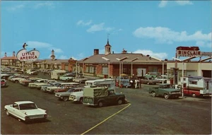 Holding Little America WY Sinclair Gas Station Campers Wyoming postcard G230 - Picture 1 of 2