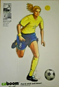 Yellow Girl Soccer Player Dribble Caboom Your Room Peel and Stick Wall Decor - Picture 1 of 1