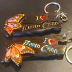 Two vintage handmade souvenir wood keychains~written n Spanish~can't make it out