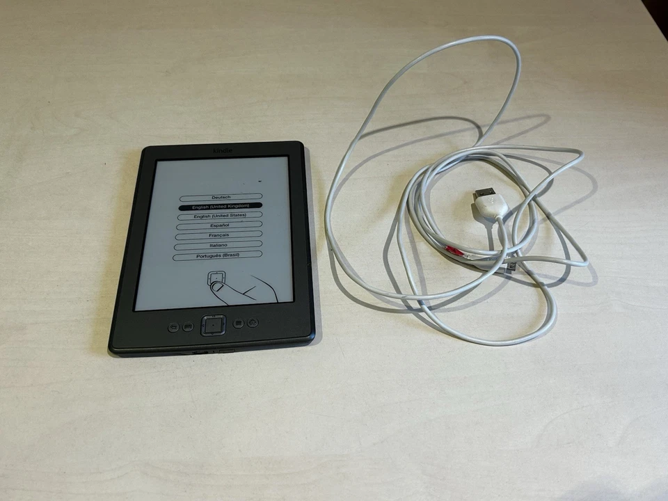 Amazon Kindle 4th Generation 6" eReader Wi-Fi Silver Works w/USB Charger Bundle - Image 1 of 4