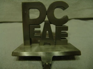 HEAVY BRUSHED SILVER 4 1/2" × 5" PEACE CHRISTMAS STOCKING HOLDER - Picture 1 of 3