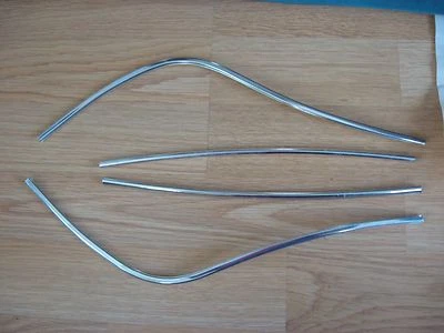 NOS 1984 FORD TEMPO OUTSIDE DOOR EDGE MOULDING KIT 4 DOOR E43Z-5420910-A  - Image 1 of 2