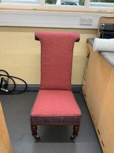 Prayer chair recently reupholstered flame retardant fabric. tradition upholstery