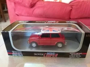 Modellino Rosso Rover MINI COOPER porte apribili scala 1/32 da collezione - Foto 1 di 9