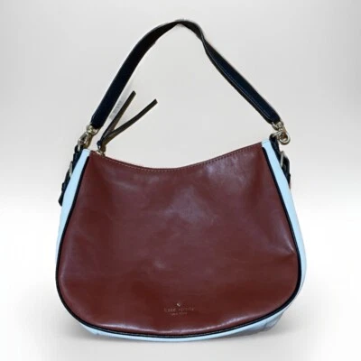 Kate Spade Hobo in Reddish Brown, White, with Black Trim & Shoulder Strap - Image 1 of 4