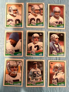 SEATTLE SEAHAWKS 1988 TOPPS EQUIPO SET BOSWORTH RADIOCONTROL Largent Easley WARNER - Imagen 1 de 2