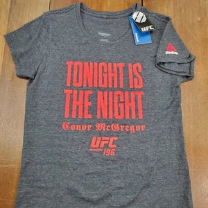 Camiseta para mujer Reebok Nueva con etiquetas UFC 196 Conor McGregor talla grande gris esta noche - Imagen 1 de 10