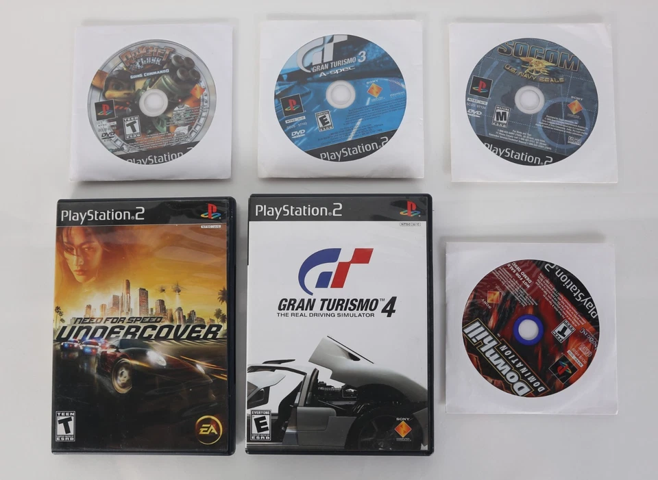 PS2 PlayStation 2 Lote de 6 Juegos Gran Turismo 3 y 4, Need for Speed, Ratchet Foto 1 de 4