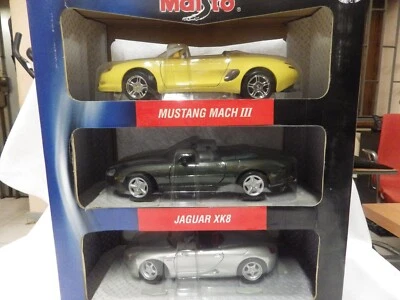 MAISTO 1/18  MUSTANG MARCH III- JAGUAR XK8 -PORSCHE  BOXSTER- RARA CONFEZIONE - Immagine 1 di 4