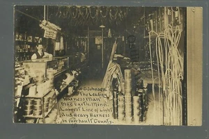 Blue Earth MINNESOTA RPPC c1910 TIENDA DE ARNESES INTERIORES PUBLICIDAD OCUPACIONAL - Imagen 1 de 5