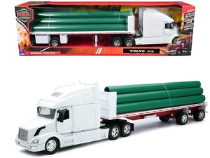 2023 Volvo VN-780 Diecast Model Truck with Flatbed Trailer & Pipes 1/32 New Ray - Picture 1 of 4