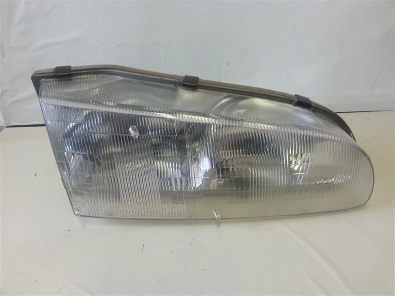 93 94 95 96 97 PRIZM RIGHT PASSENGER HEADLIGHT HEAD LIGHT DT-148794 - Image 1 of 2