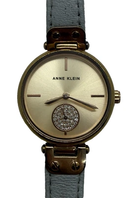 Reloj para mujer Anne Klein oro rosa detalles estrás AK/3380 correa de cuero gris Foto 1 de 4
