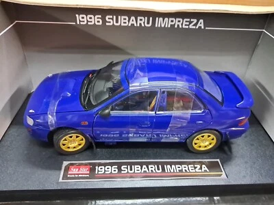 Sunstar Subaru Impreza 1996    1/18 - Immagine 1 di 3
