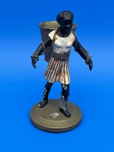 Estatuilla estatua pesada vintage con soporte de cesta Blackamoor mujer con canasta - Imagen 1 de 17