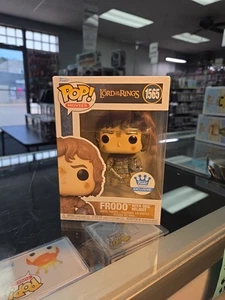 Funko Pop! The Lord of the Rings Frodo with Orc Helmet Exclusive #1565 Protector - Picture 1 of 6