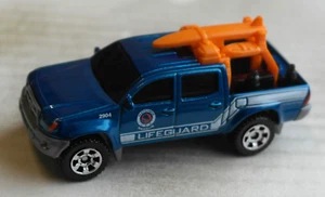 Matchbox Toyota Tacoma Pickup Bagnino Blu Metallizzato Multipack Esclusivo MBX - Foto 1 di 4