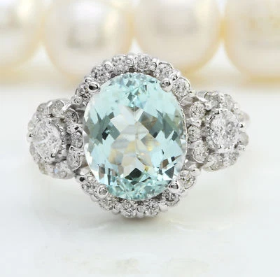 Anillo de oro blanco macizo de 14 quilates de aguamarina azul natural y diamantes de 4,97 quilates Foto 1 de 4