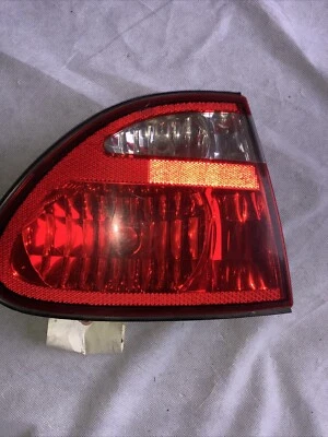 Oldsmobile Alero 1999 a 2004 conductor izquierdo lado izquierdo luz trasera interior OEM Foto 1 de 4