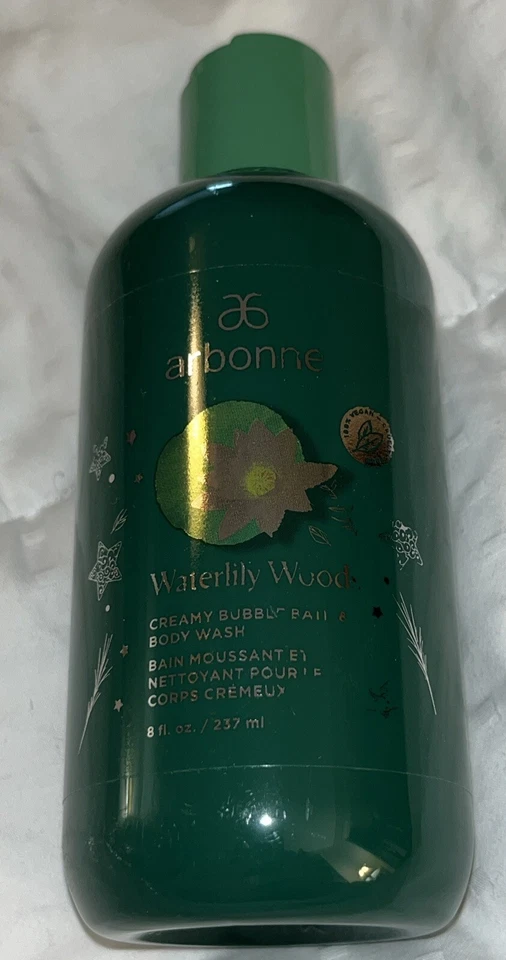 Jabón corporal y baño de burbujas cremosas fragancia madera nenúfar Arbonne 8 fl oz Foto 1 de 4