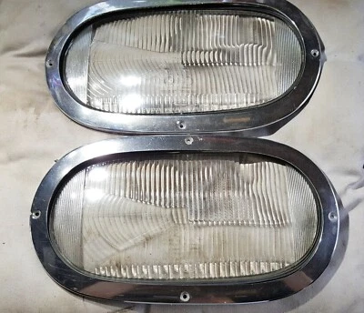 LENTE DE LÁMPARA DE CABEZA TEMPRANA VOLKSWAGEN 411 GENUINA Y LLANTA CROMADA. BUEN ESTADO Foto 1 de 4