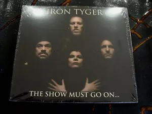 Slip CD Album: Iron Tyger: The Show Must Go On ..: The Works Of Queen Sealed - Bild 1 von 2