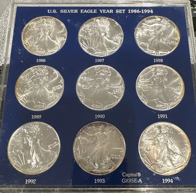 Juego completo de 9 monedas American Silver Eagle 1986-1994 en soporte de plástico capital Foto 1 de 2