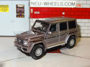 ERA CAR - MERCEDES-BENZ AMG G63 4X4 - DAKOTA BROWN WITH FIGURE - Picture 1 of 8