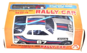 Seltenes Asahi Porsche 924 Rallye Auto Batteriebetrieben Fernbedienung Vintage Blechspielzeug - Bild 1 von 24