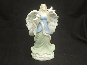 Paloma de porcelana vintage Angel Holding 8,5" de alto x 4,5" de ancho x 3,5" D azul verde - Imagen 1 de 3