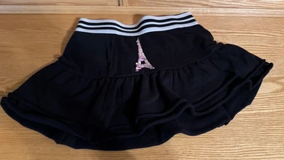 Falda corta Justice Paris negra talla 12 mini cintura elástica plisada volantes Foto 1 de 4
