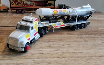 Camion gmc porte fusée majorette ho 1/87 - Photo 1/2