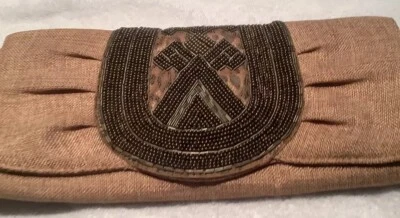 Bolso clutch grande con cuentas beige de Chico's Southwestern Foto 1 de 4